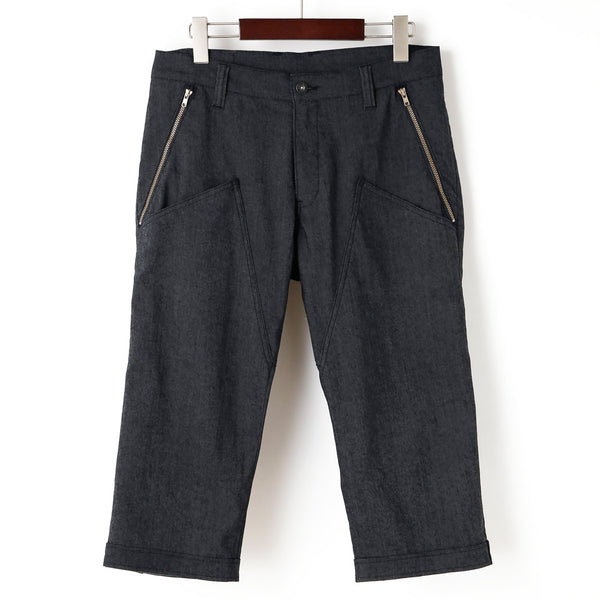 Cropped pants with hem belt and above-knee pockets